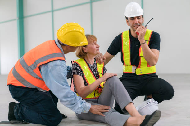 istock Emergency help engineers provide first aid to construction workers in accidents. Safety team help a construction worker who has an accident. 1479101813