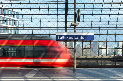 Blurred Motion Of Train At Railroad Station, Berlin Hauptbahnhof