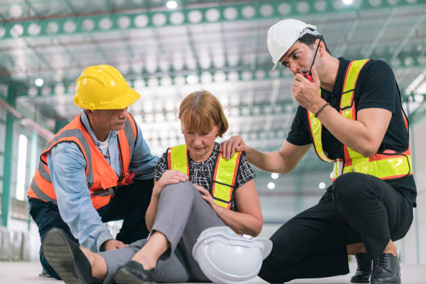 istock Emergency help engineers provide first aid to construction workers in accidents. Safety team help a construction worker who has an accident. 1479102921