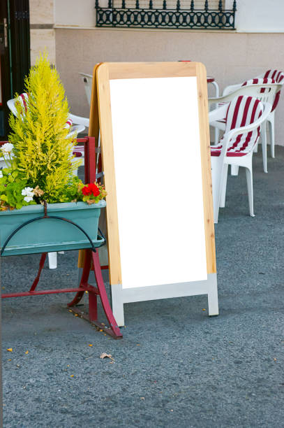istock Vertical shot of an empty white billboard in a restaurant 1479105562