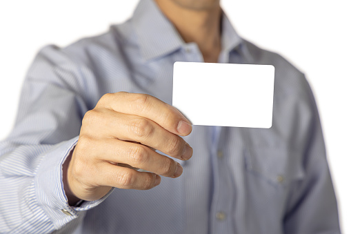 Close up of a man showing a blank card.