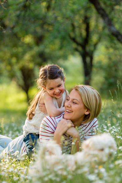 istock Family enjoys spring playing in the yard 1479109209