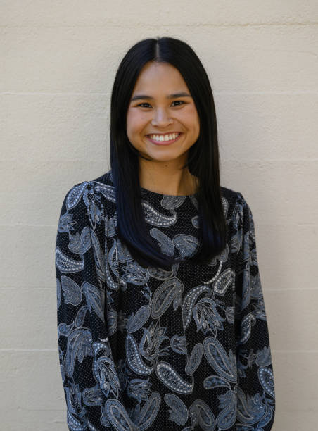 istock Attractive Young Asian American College Graduate 1479110622