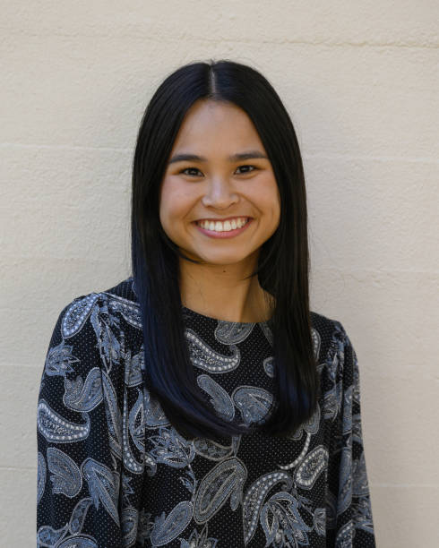 istock Attractive Young Asian American College Graduate 1479110873