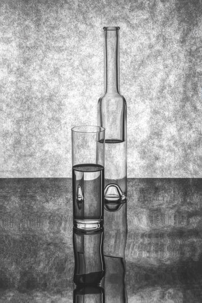 Black and white still life with glass utensils