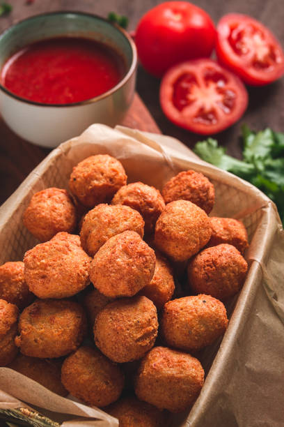 Chicken popcorn, deep fried, nuggets, close-up, rustic, no people,