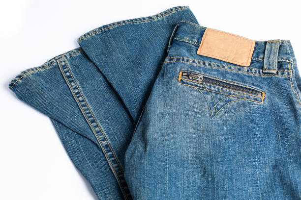 istock Blue denim jeans with seam texture banner with copy space for text design background. Canvas denim fashion jeans and pocket texture. Panoramic fashion banner 1479112582
