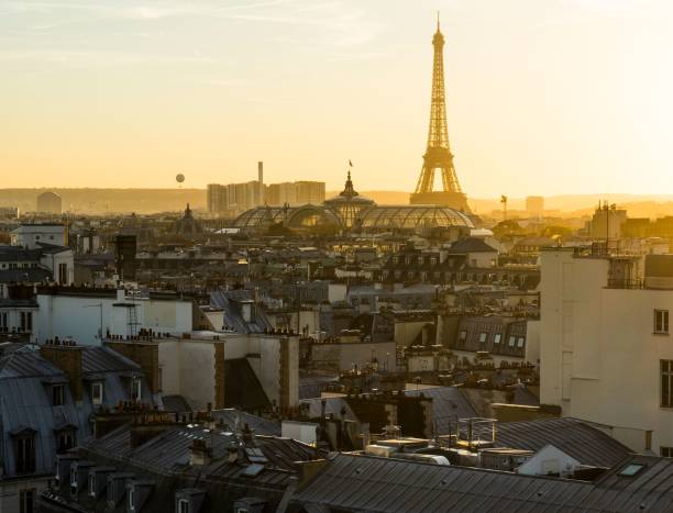 istock Iconic Eiffel Tower viewed from the city at sunset. 1479113868