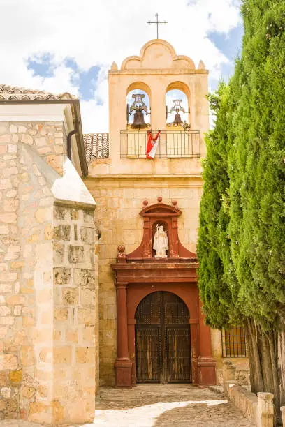Photo of Entrance door of the main church in the small town of El Toboso (Spain)