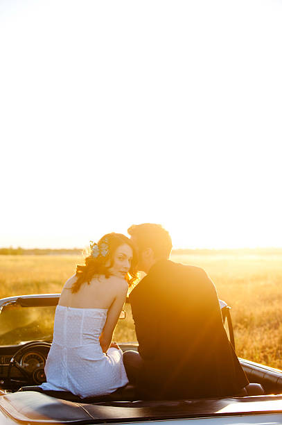 istock Young Couple in Classic Car 147913086