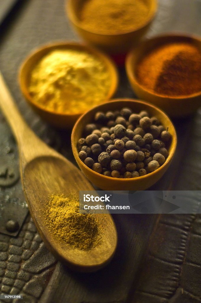 Spices Grouping of spices on antique background Allspice Stock Photo