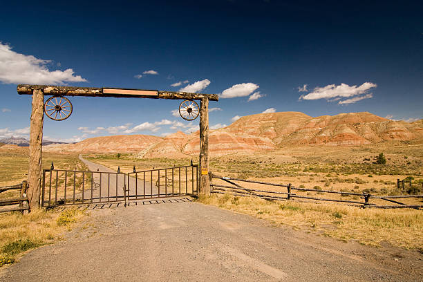 Entrance to the ranch Entrance to the ranch, wild west ranch stock pictures, royalty-free photos & images