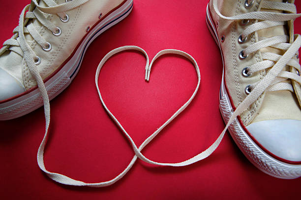 istock Canvas shoes with the laces creating a heart shape 147913735