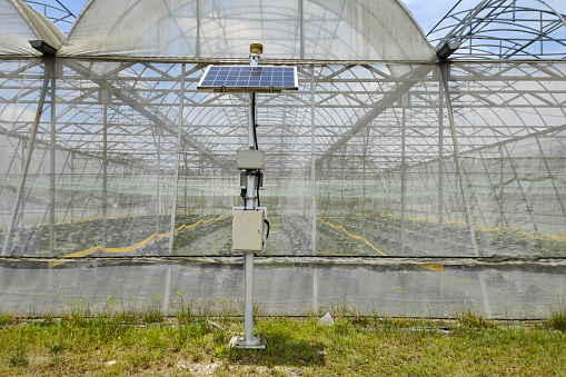 Solar power system at organic agriculture greenhouse farm in Malaysia.