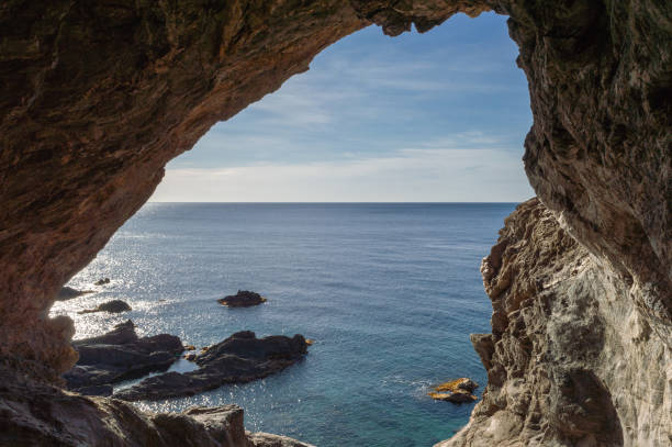 istock Stone arch overlooking the sea 1479142283