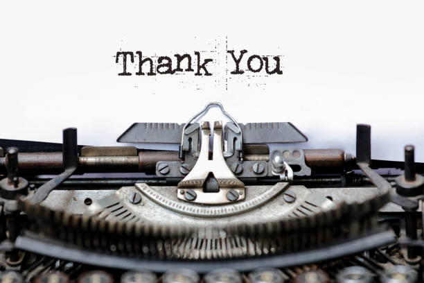 Thank you lettering on typewriter Thank you lettering on typewriter typewriter keyboard stock pictures, royalty-free photos & images