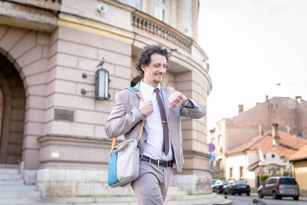 istock Checking the time on his wrist watch 1479143758