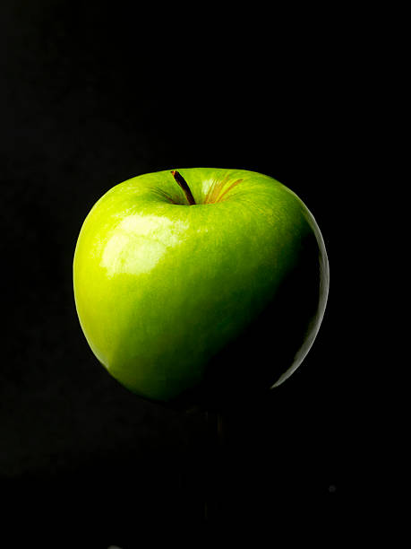 apple on black stock photo