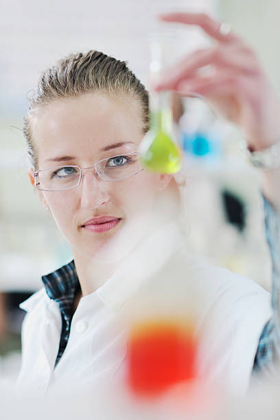 istock young woman in lab 147914900