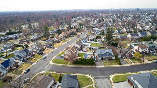 istock Middle Class Neighborhood flyover NYC in the far background 1479149294