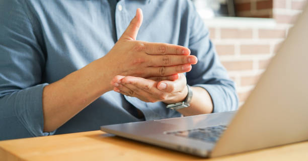 istock close up man hand gesture about stop sign language to teaching or learning from webinar in home for lifestyle concept 1479150459