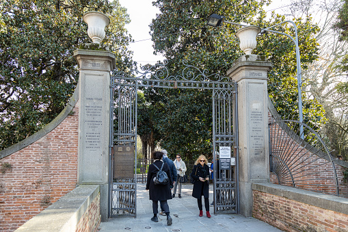 Padua, Veneto, Italy - Mar 11th, 2023: People at Padua Botanical Garden entrance