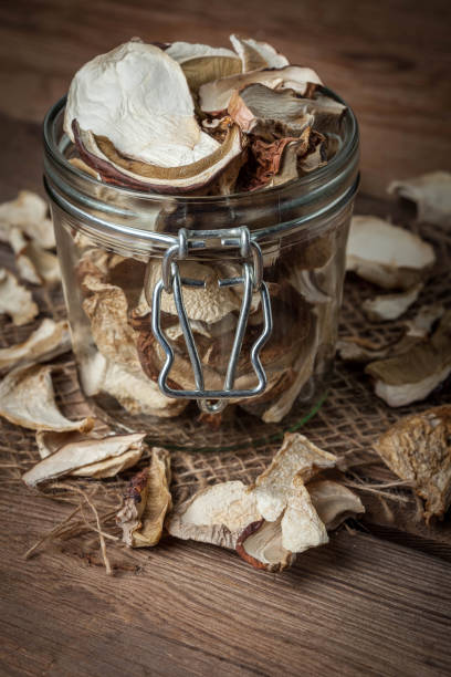 istock Dried mushrooms in jar. 1479153830