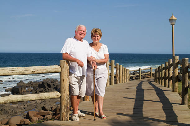 istock senior couple on beach 147915447