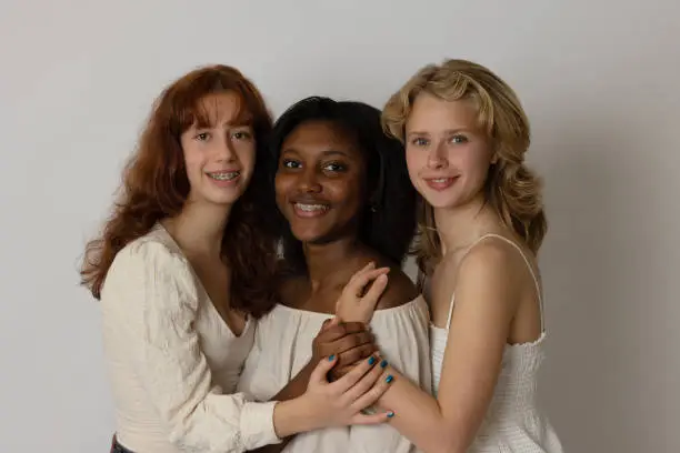 Black, blonde and brunette young women portrait showing diversity. Generation Z