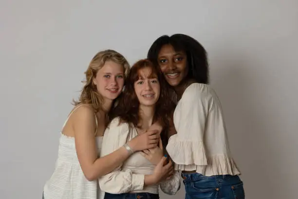 Black, blonde and brunette young women portrait showing diversity. Generation Z