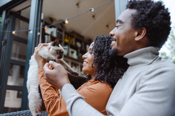 istock Happy couple with pet 1479157653