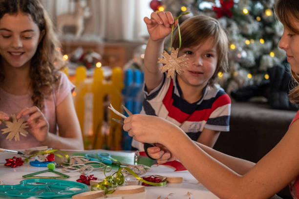 istock Group of children making a decoration at home 1479157680