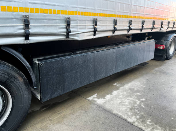 istock Box in a semi-trailer with stacked wooden pallets 1479159750