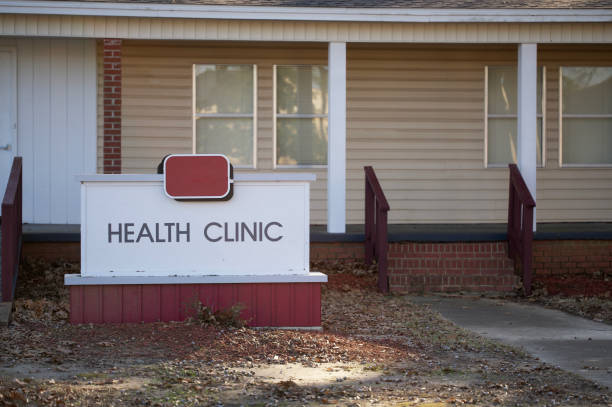 Health clinic sing in front of small building