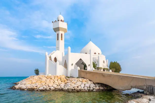 Photo of White Salem Bin Laden Mosque built on the island with sea in the background, Al Khobar, Saudi Arabia