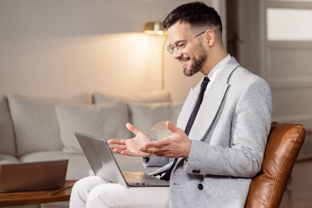 istock Male entrepreneur gesturing while having a video call with his team 1479167756