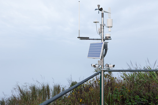Weather station at mountain on overcast day