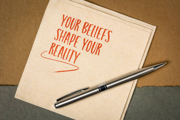 istock Your beliefs shape your reality. Inspirational note or reminder on a napkin. Mindset and personal development concept. 1479171142