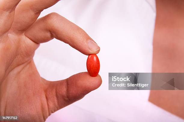 Foto de Comprimido Vermelho e mais fotos de stock de Alimentação Saudável - Alimentação Saudável, Branco, Comprimido