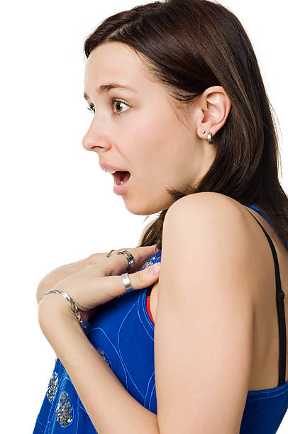 istock Surprised young woman isolated on white background 147917187