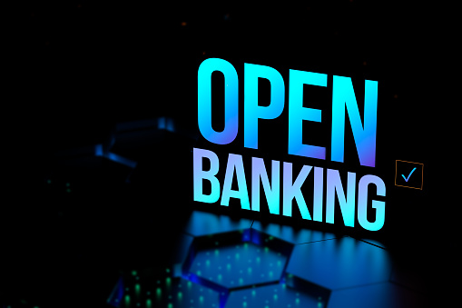 Open banking concept neon with blurred background. The use of open API in the financial sector. 3D render illustration.