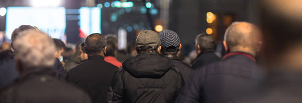istock crowd of people watching a concert 1479177219