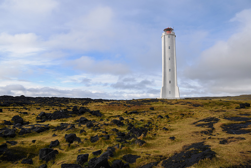 Malarrif Lighthouse is located close to the Lóndrangar volcanic pillars at the southernmost tip of Snæfellsnes peninsula in Snæfellsjökull National Park. The original 20 meter tall iron tower was build in 1917. The current cylindrical concrete tower with four buttresses was constructed in 1946.\n\nA newer lighthouse was build 1946 and is 20,2 meters also an house for the lighthouse keeper as build, a bit later. \n\nThe lighthouse was protected the year 2003, along with six others along the coastline, when 125 years had passed since the first lighthouse was build in Iceland.