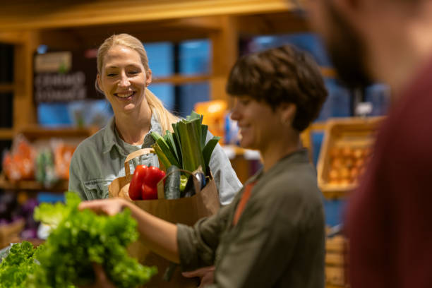 istock Customers are buying vegetables in the store. 1479200290
