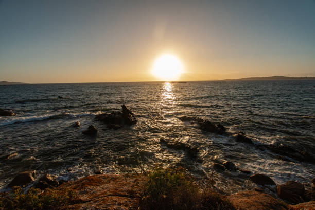 istock Wavy sea with rocky formations during sunset 1479200514