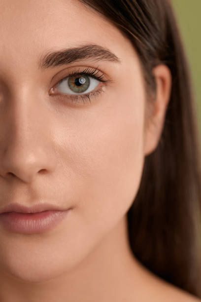 istock Half female face with perfect clean skin 1479201486