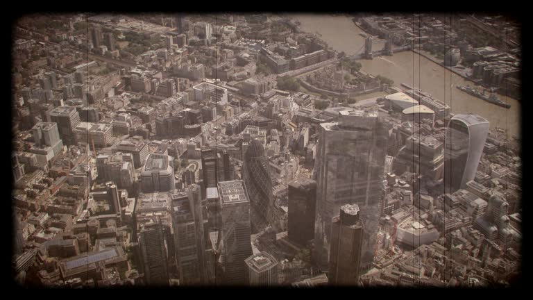 Old Film Aerial View of The City and the River Thames, London, UK. 4K
