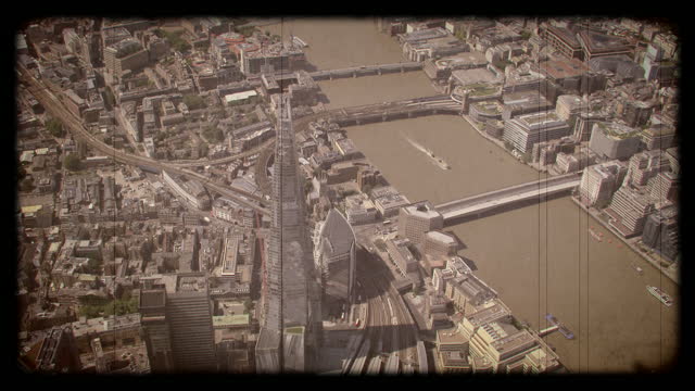 Old Film Aerial View of The Shard, River Thames and Central London, UK. 4K