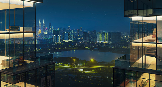 Fully floor-to-ceiling glass modern high-end apartment or office with beautiful night city view . 3d rendering