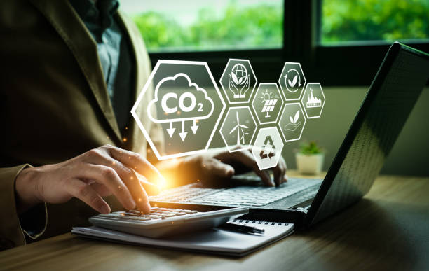 istock CO2 emission reduction concept, businessman with environmental technology Icons, global warming, sustainable development, renewable energy business. climate change, carbon capture, storage, reuse 1479221174